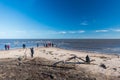 Cape Kolka, tourists after storm and Baltic sea, Latvia.