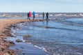 Cape Kolka, tourists after storm and Baltic sea, Latvia.