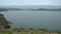 Cape on lake, rocky coast. concept of travel.beautiful landscape of Siberian Baikal Lake.