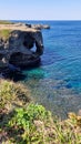 Cape Manzamo Rocky beach on Okinawa with blue waters Royalty Free Stock Photo
