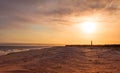 Cape May NJ lighthouse at sunset in early spring Atlantic Ocean with warm soft light Royalty Free Stock Photo