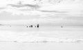 Kids Swimming on Fish Hoek beach on a cloudy day