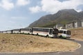 Cape Town. Municipal buses parked along road.