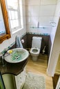 Inside interior of empty bathroom and toilet in up-market house in the suburbs