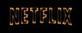 Yellow Burning Flames Effect on Netflix Icon Logo against black background