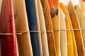 Retro vintage surfboards lined up in a local surf shop