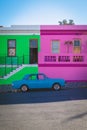 Bo Kaap colorful houses and blue retro car in Cape Town Royalty Free Stock Photo