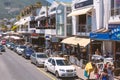 Street of Camps Bay with lots of resturants and cafes and crowded with tourists Royalty Free Stock Photo