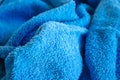 Plush blue fabric creating soothing patterns and contours.