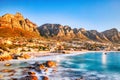 Cape Town Sunset over Camps Bay Beach with Table Mountain and Twelve Apostles in the Background Royalty Free Stock Photo