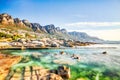 Cape Town Sunset over Camps Bay Beach with Table Mountain and Twelve Apostles in the Background Royalty Free Stock Photo