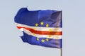 Cape Verde flag waving dusted with sand in strong vind Royalty Free Stock Photo