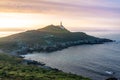 Cape Vilan Lighthouse, Cabo Vilano, in Galicia at sunset, Spain Royalty Free Stock Photo