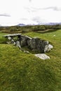 Capel Garmon Burial Chamber with Welsh Mountains in Distance