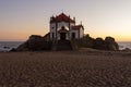 Capela do Senhor da Pedra or Lord of the rock chapel illuminated at night, Miramar,