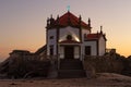 Capela do Senhor da Pedra or Lord of the rock chapel illuminated at night, Miramar,