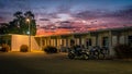 Capella, Queensland, Australia - Two identical BMW GS bikes parked next to the motel at sunset Royalty Free Stock Photo