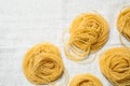 Capellini pasta on white tablecloth Royalty Free Stock Photo