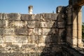 Capernaum synagogue walls with a blue sky in the background, Israel