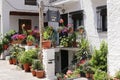 Capileira, Andalucia, Spain - May 29, 2019: Many flowers in flower pots on the street of Capileira Spain