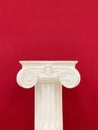 Capital of the ancient Greek Ionic order isolated over white background vintage Royalty Free Stock Photo