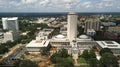 Flags Blow Atop The Capital Dome in Tallahassee Florida