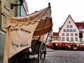 Evening  in Tallinn streets Medieval Vagon street cafe People walking  relaxing  in the summer evening sunset in the old city of T Royalty Free Stock Photo