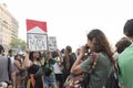 Rally in favor of legal, safe and free abortion. Woman photographing feminist posters