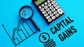 Capital gains is shown using the text Royalty Free Stock Photo