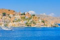 The capital of the island of Symi - Ano Symi. Harani area Royalty Free Stock Photo