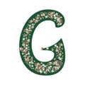 Capital letter G of the alphabet is decorated with jewelry and pearls. Precious blue and white pearls