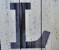 Capital Letter `L` on white painted wood grunge look