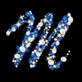 Capital letter M of the alphabet is decorated with jewelry and pearls. Precious blue and white pearls