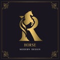 Capital Letter R with a Horse. Royal Logo. King Stallion in Jump. Racehorse Head Profile. Gold Monogram on Black Background with