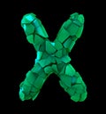 Capital letter X made of broken plastic green color isolated on black background