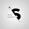 Capital S letter is inserted in the paper slot with the plane slice letter S for travel logo