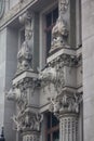 Capital and the upper part of the facade with sculptures of animals on the historic Art Nouveau building