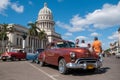 Classic car parked in front of the Havana capitol. Cuba