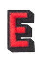 capitol letter E of stitched with thread