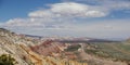 Capitol reef, central Utah, USA. Panoramic overview to valley and mountains with beautiful lens clouds in blue sky. Royalty Free Stock Photo