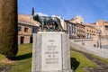 The Capitoline Wolf statue under the Roman aqueduct in Segovia