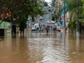 People crossing flooded streets - Capivari river overflow - Sao Paulo - Brazil