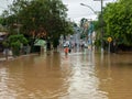 People crossing flooded streets - Capivari river overflow - Sao Paulo - Brazil