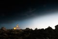 Capo Testa lighthouse at dusk Royalty Free Stock Photo
