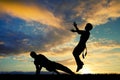 Capoeira dance at sunset