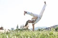 Capoeira woman, awesome stunts in the outdoors Royalty Free Stock Photo