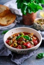 Caponata siciliana in ceramic bowl