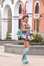 Caporales dancers in colourful costumes performing as they parade through the mining city of Potosi, ahead of Bolivian