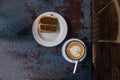 cappachino with heart foam and carrot cake