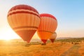 Cappadocia air balloons flying at dawn in Turkey Royalty Free Stock Photo